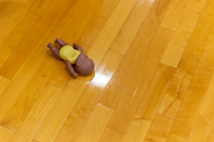 A kewpie doll on the basketball court has serious historical relevance at Columbia Hickman.